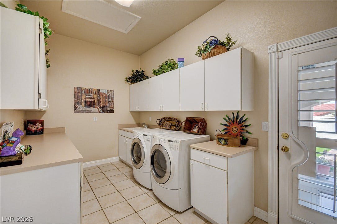 2000 Alexa Breanne Court, Las Vegas, NV 89117 Ample cabinetry and tile flooring define this highly functional workspace.