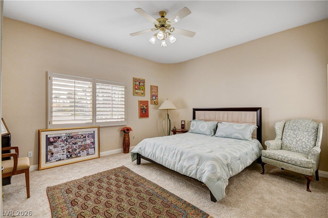 2000 Alexa Breanne Court, Las Vegas, NV 89117 Plentiful natural light filters through plantation shutters into this comfortable bedroom with soft carpeting.