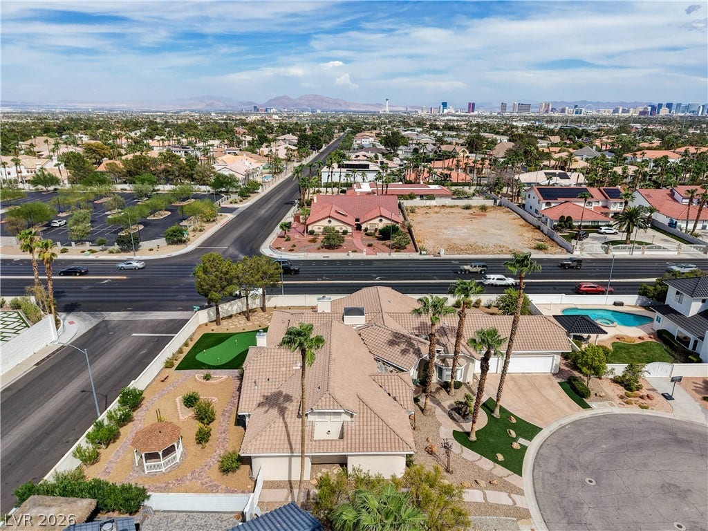 2000 Alexa Breanne Court, Las Vegas, NV 89117 Distant city skyline and mountain views frame this suburban neighborhood setting.