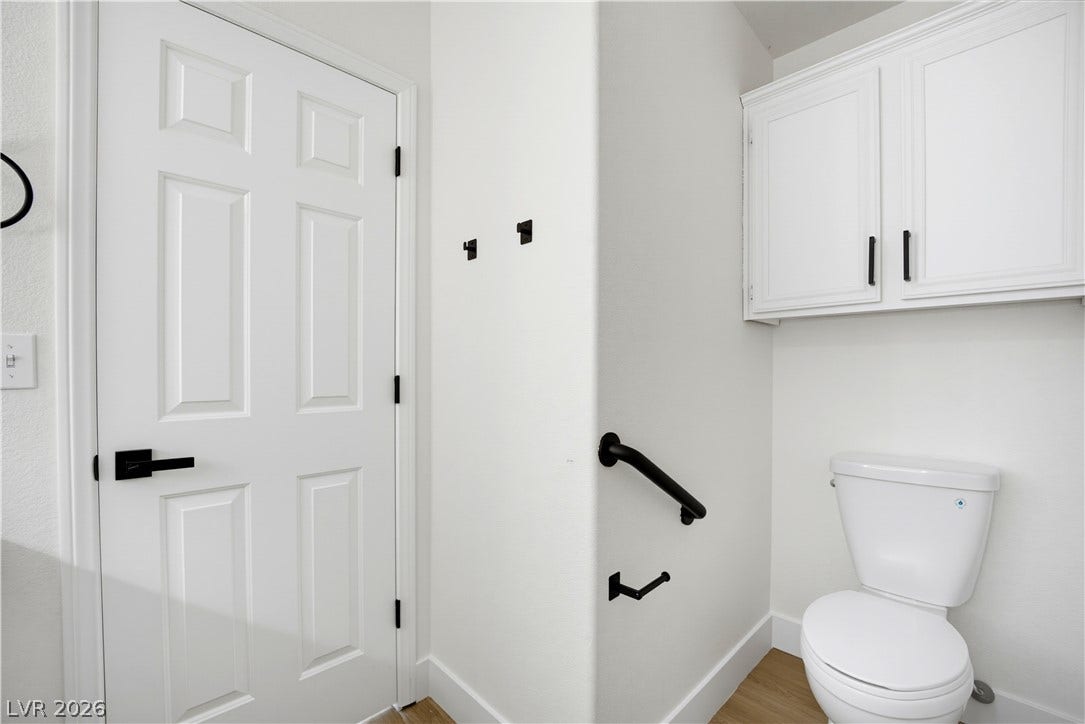 4722 Casa Bonita Drive, North Las Vegas, NV 89032 Crisp white walls and clean lines define this modern, functional bathroom space.