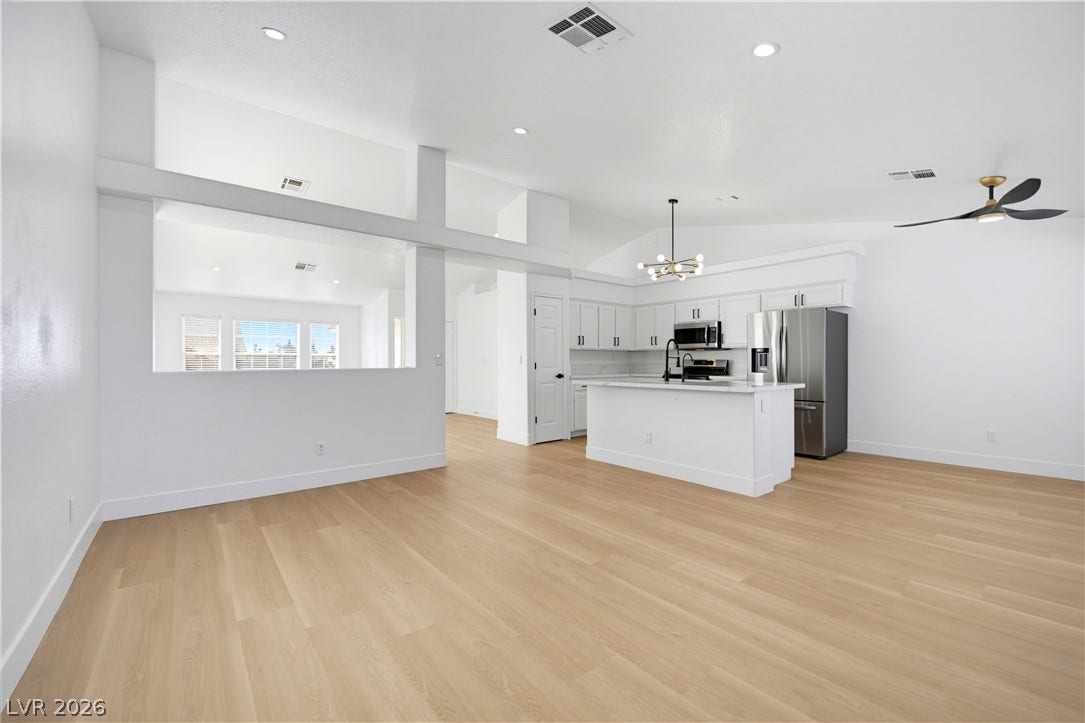 4722 Casa Bonita Drive, North Las Vegas, NV 89032 An open layout connects the airy living space directly to a sleek modern kitchen.