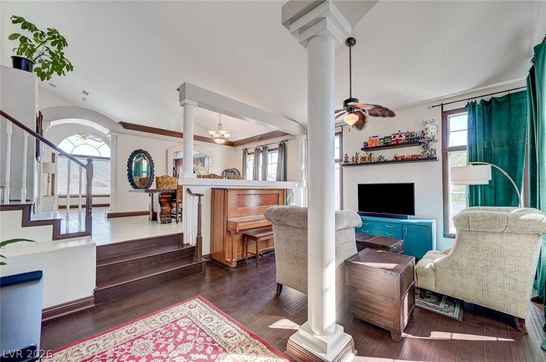 2722 Aspen Wood Avenue, Henderson, NV 89074 Gleaming hardwood floors and classic columns define this multi-level main living space.