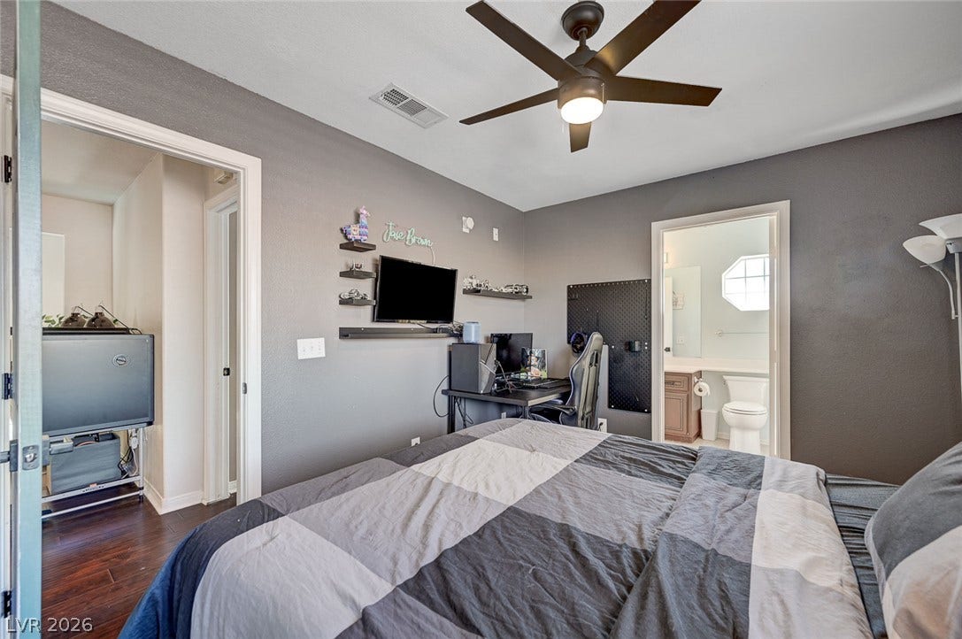 2722 Aspen Wood Avenue, Henderson, NV 89074 Gleaming hardwood floors and a smooth plaster finish define this comfortable bedroom suite.