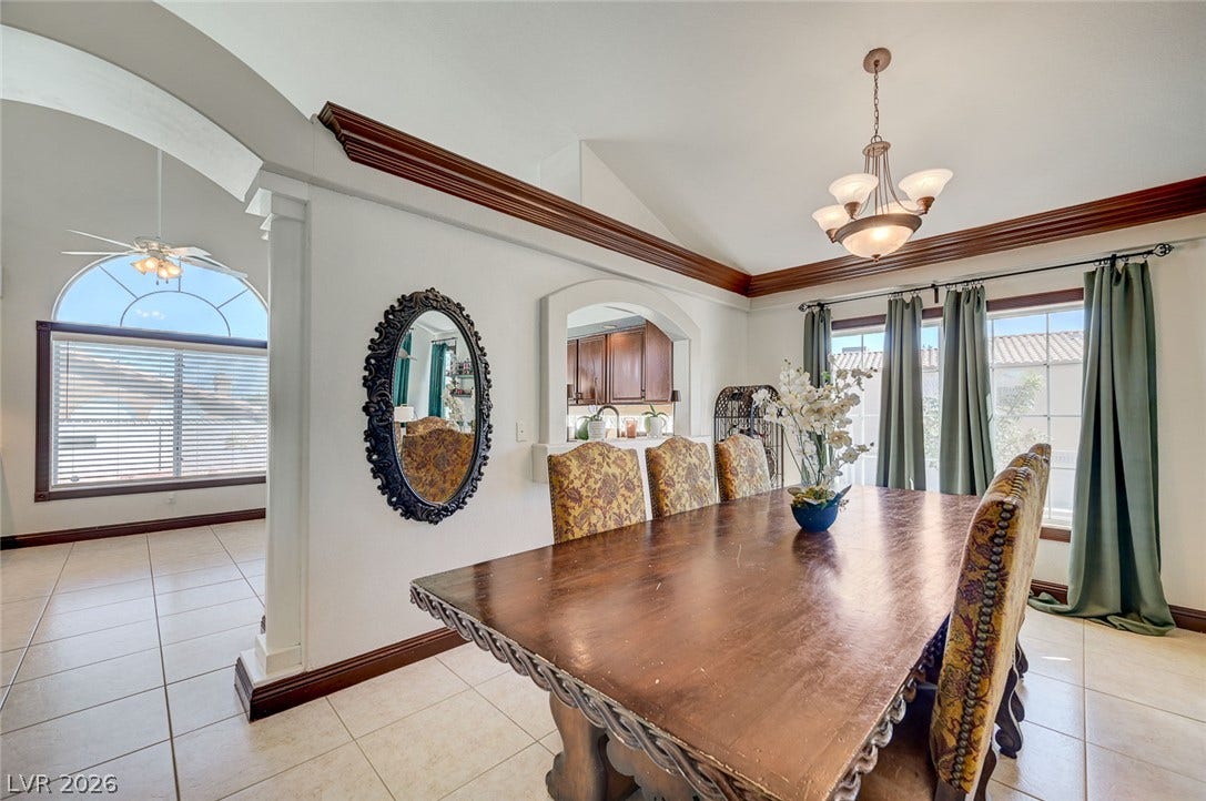 2722 Aspen Wood Avenue, Henderson, NV 89074 Rich wood trim and polished tile floors define this elegant dining area.
