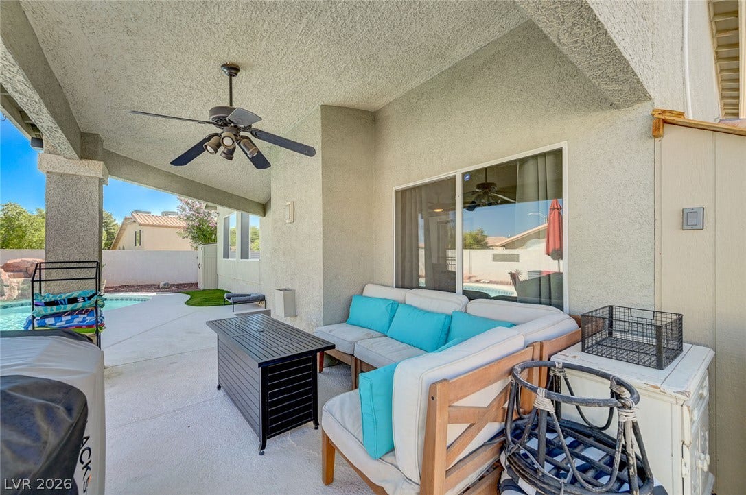 2722 Aspen Wood Avenue, Henderson, NV 89074 Shaded concrete patio features textured stucco columns and overlooks the private backyard swimming pool.