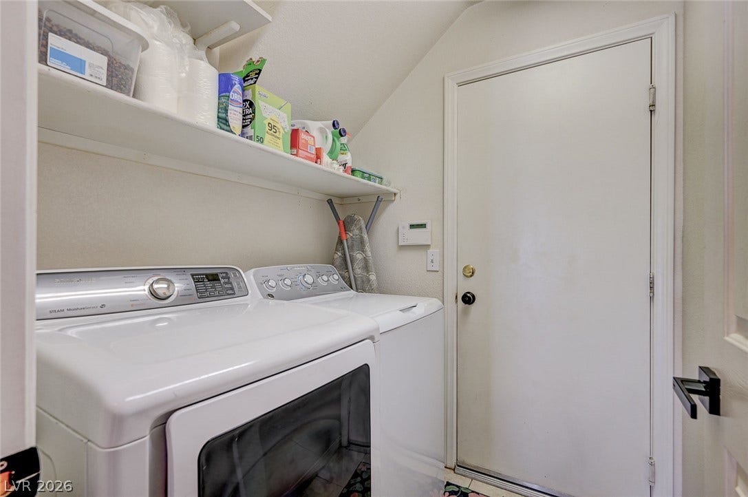 2722 Aspen Wood Avenue, Henderson, NV 89074 Functional laundry utilities complement the home with built-in shelving overhead.
