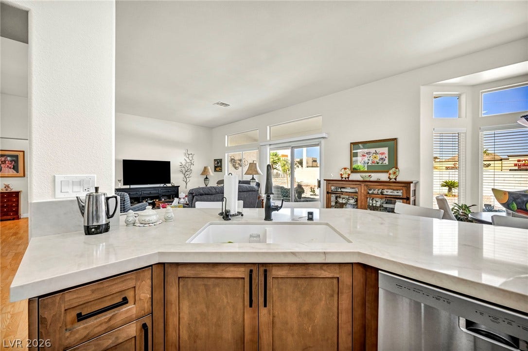 10020 Villa Ridge Drive, Las Vegas, NV 89134 An open kitchen layout flows seamlessly into the bright adjacent living areas.