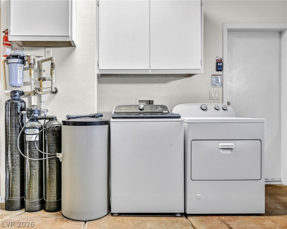 10020 Villa Ridge Drive, Las Vegas, NV 89134 Functional workspace features built-in upper cabinetry and durable flooring.