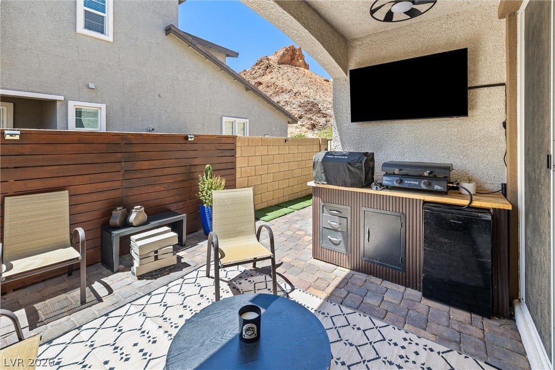 44 Kimberlite Drive, Henderson, NV 89011 Enjoy outdoor entertaining with this well-appointed patio, featuring ample space for relaxation.