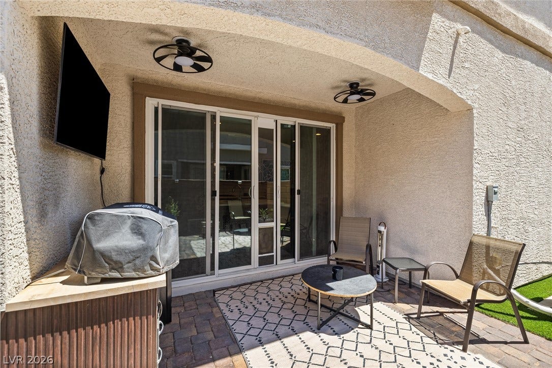 44 Kimberlite Drive, Henderson, NV 89011 This inviting outdoor space features a covered patio, ideal for relaxation and entertaining.