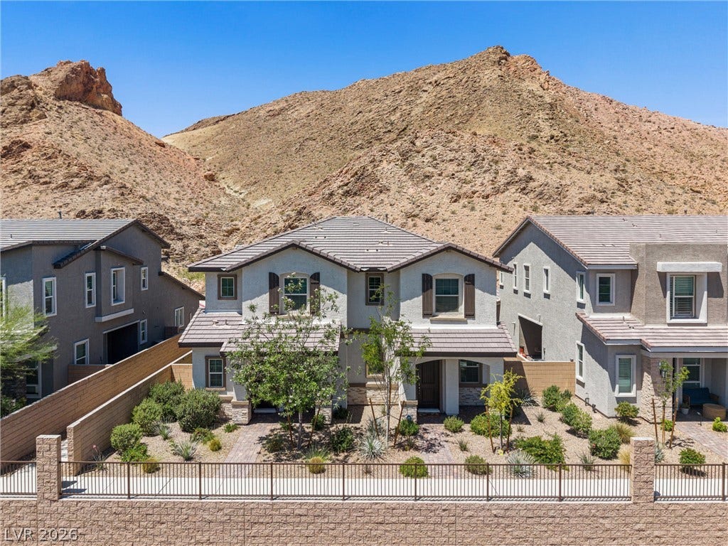 44 Kimberlite Drive, Henderson, NV 89011 This desert dwelling offers captivating mountain views on an elevated lot.