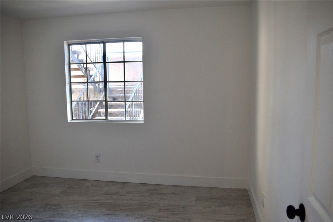 230 Mission Catalina Lane, #107, Las Vegas, NV 89107 Clean lines and light-toned flooring define this versatile interior space.