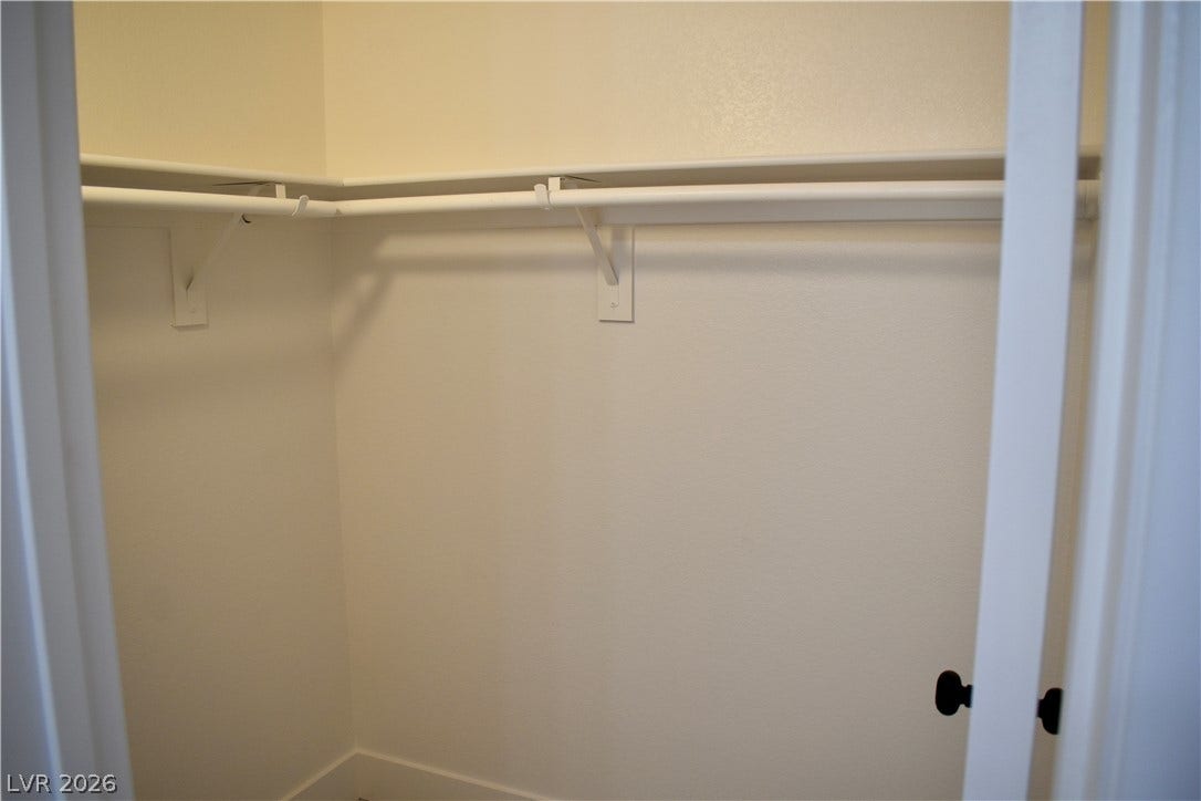 230 Mission Catalina Lane, #107, Las Vegas, NV 89107 Ample hanging rods and shelving optimize this functional storage space.