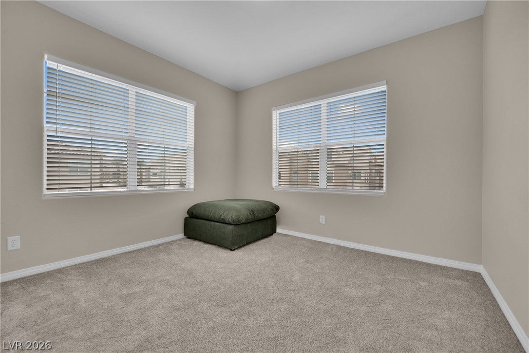 8777 W Maule Avenue, #2109, Las Vegas, NV 89148 Plush wall-to-wall carpeting and dual windows enhance this versatile secondary room.