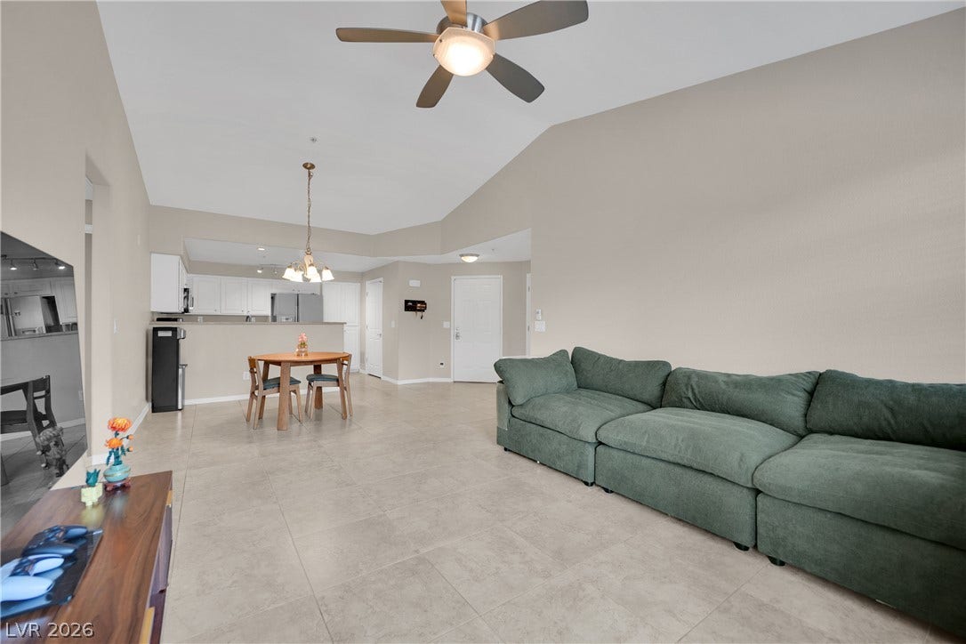 8777 W Maule Avenue, #2109, Las Vegas, NV 89148 An open layout connects the main living space with a dining area and kitchen.