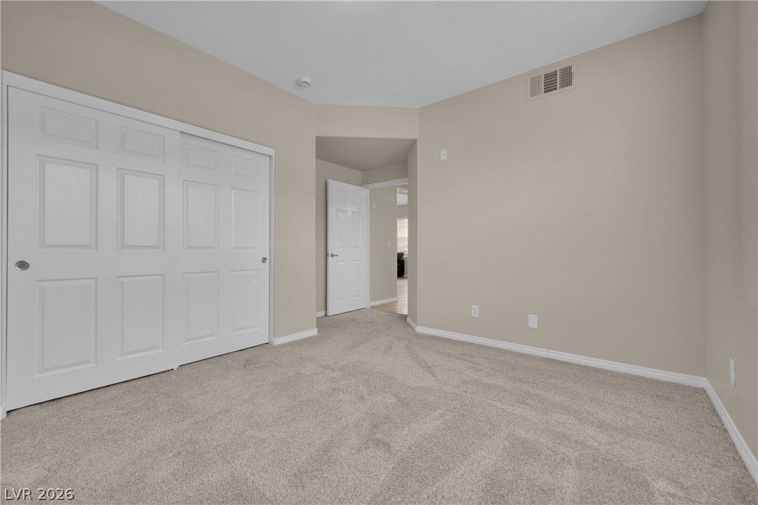 8777 W Maule Avenue, #2109, Las Vegas, NV 89148 Soft carpeting pairs with neutral walls in this comfortable bedroom space.