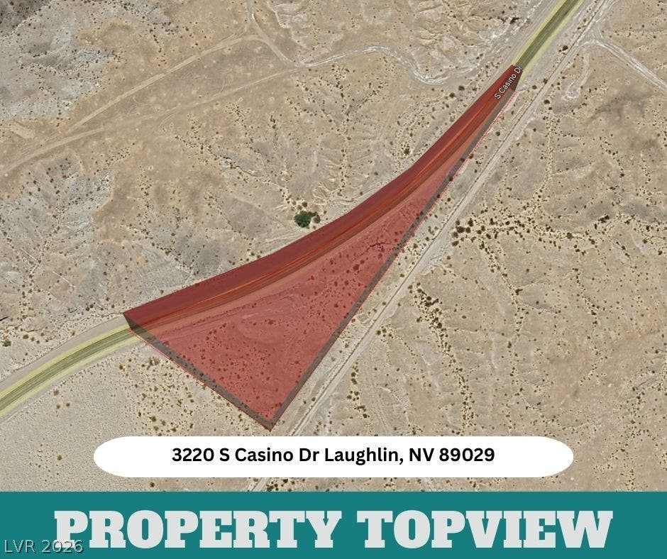 3220 Casino Dr, Laughlin, NV 89029 An aerial perspective outlines the generous acreage of this desert parcel.