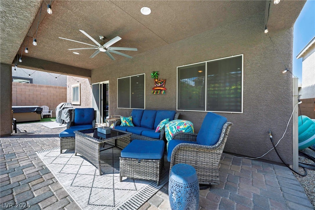 152 Dunblane Street, Henderson, NV 89012 A spacious covered patio features durable paver flooring and recessed lighting.