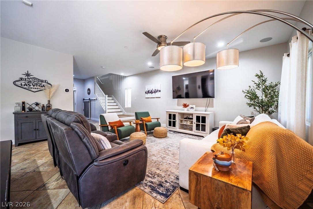152 Dunblane Street, Henderson, NV 89012 Clean lines and durable tile flooring define this inviting, open-concept living area.