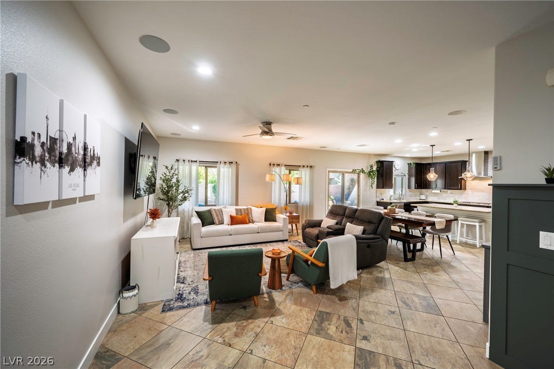 152 Dunblane Street, Henderson, NV 89012 An open floor plan seamlessly connects the central living area with the adjacent kitchen.