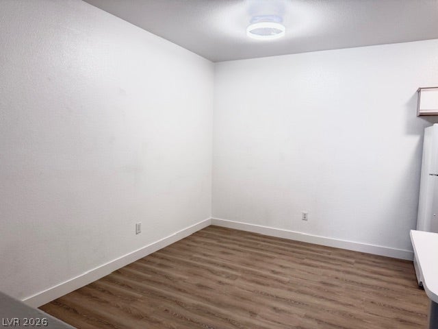 Smooth wood-look flooring and clean walls define this versatile interior alcove.