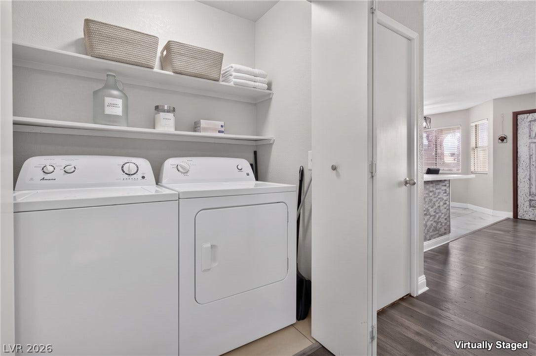 1341 Pinto Rock Lane, #202, Las Vegas, NV 89128 Convenient laundry space features built-in shelving and easy access to the main living areas.