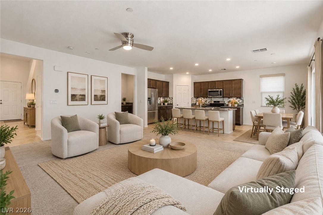 6047 Castle Gardens Avenue, Las Vegas, NV 89130 An open floor plan seamlessly connects the living space to the adjacent kitchen and dining area.