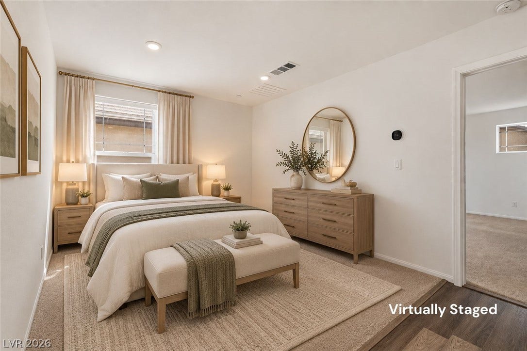 6047 Castle Gardens Avenue, Las Vegas, NV 89130 Recessed lighting and soft carpet floorings bring cozy comfort to this peaceful bedroom retreat.
