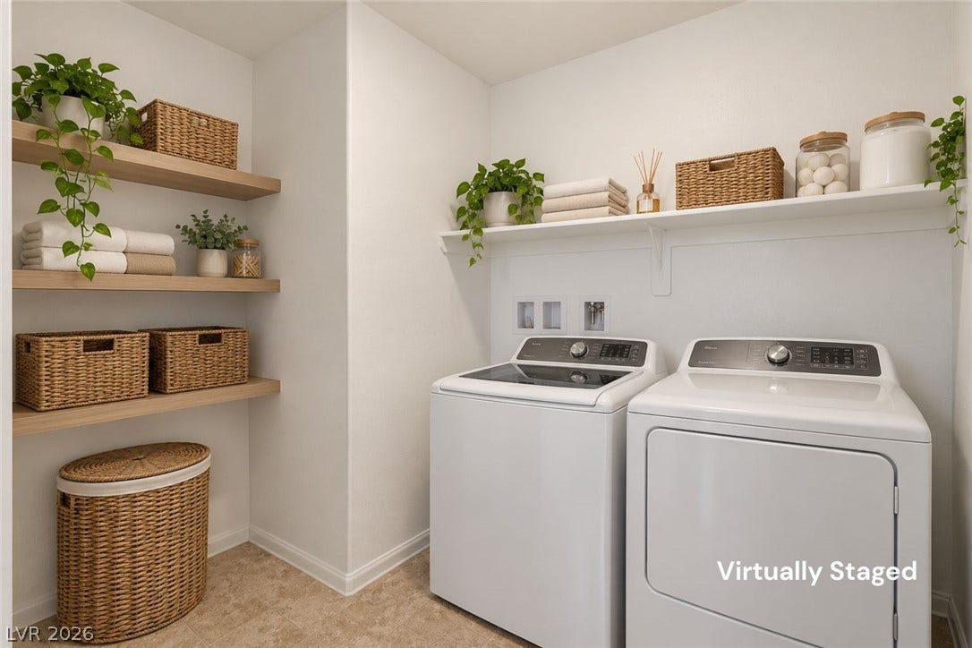 6047 Castle Gardens Avenue, Las Vegas, NV 89130 A functional utility space includes built-in open shelving and modern laundry appliances.