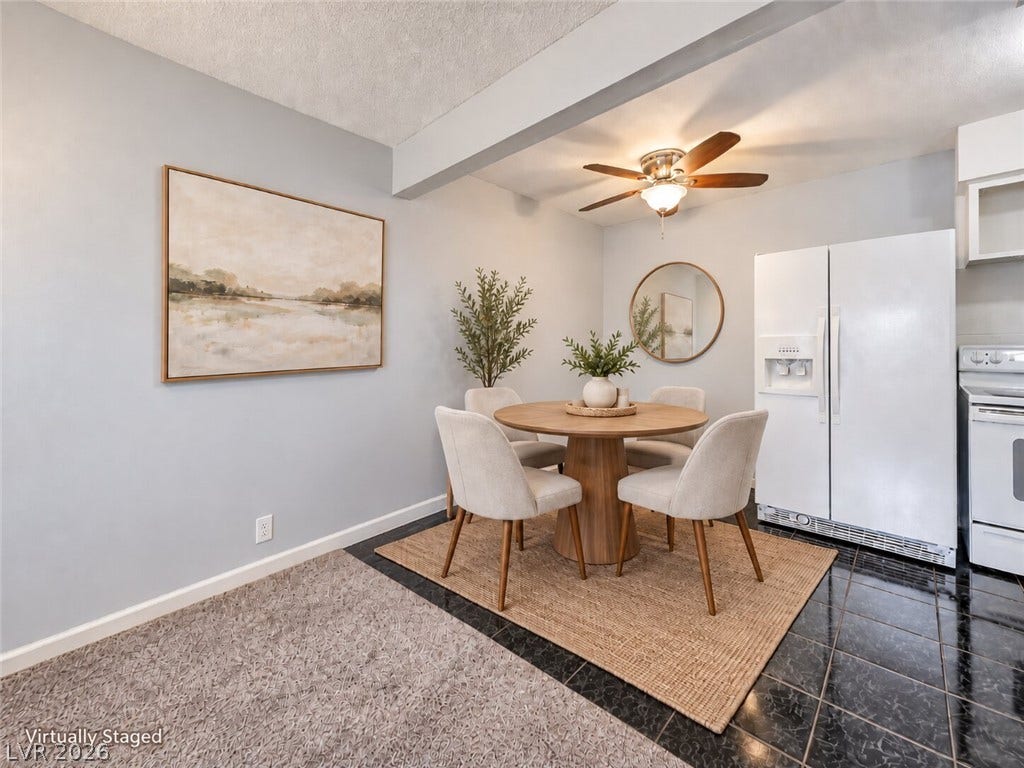 615 S Royal Crest Circle, #16, Las Vegas, NV 89169 An open dining nook connects seamlessly to the tiled kitchen space.