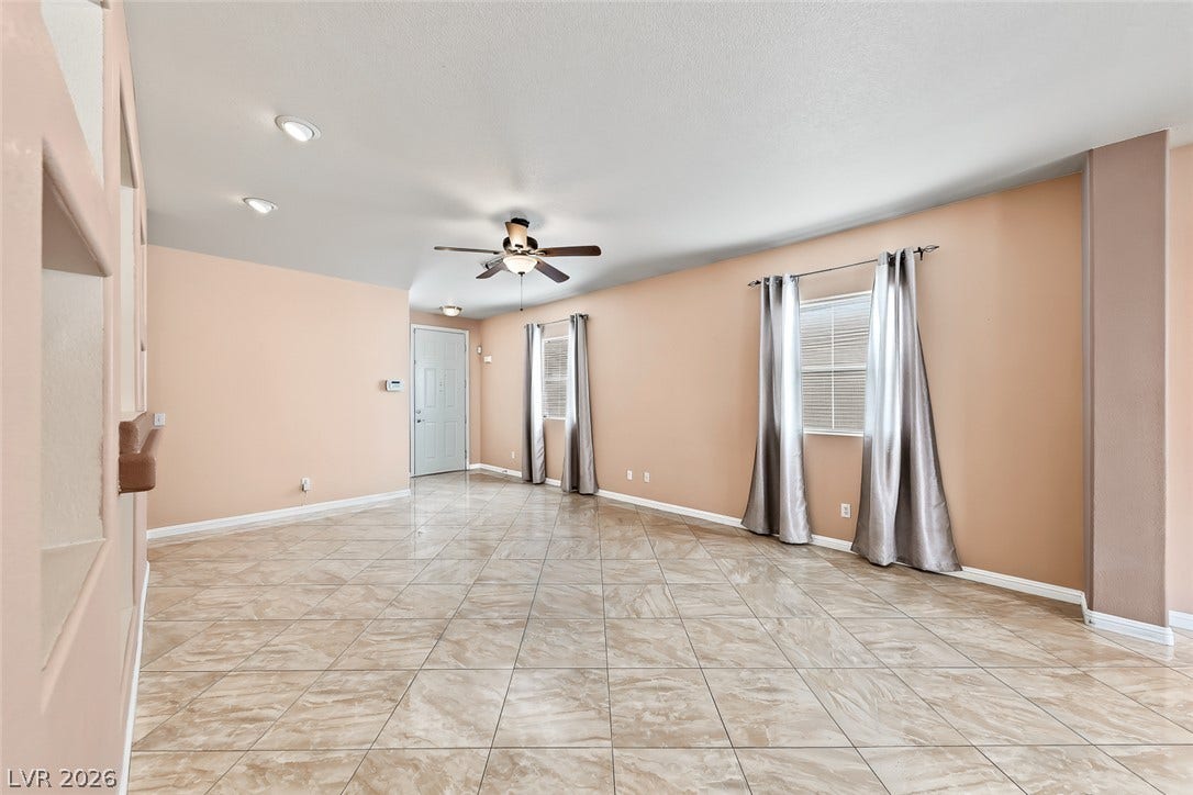 2906 Pumpkin Harvest Avenue, North Las Vegas, NV 89031 Polished tile flooring and an open layout create a welcoming first impression.