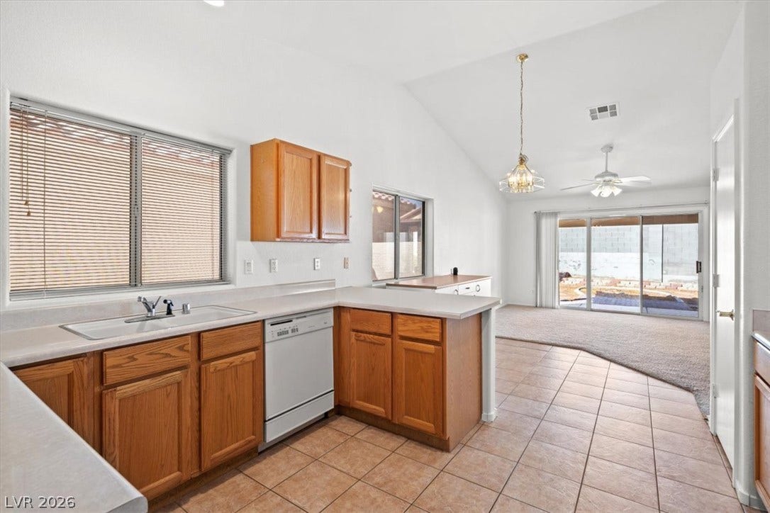 3535 Barrel Bronco Court, North Las Vegas, NV 89032 An open floorplan seamlessly connects the kitchen to the main living areas.
