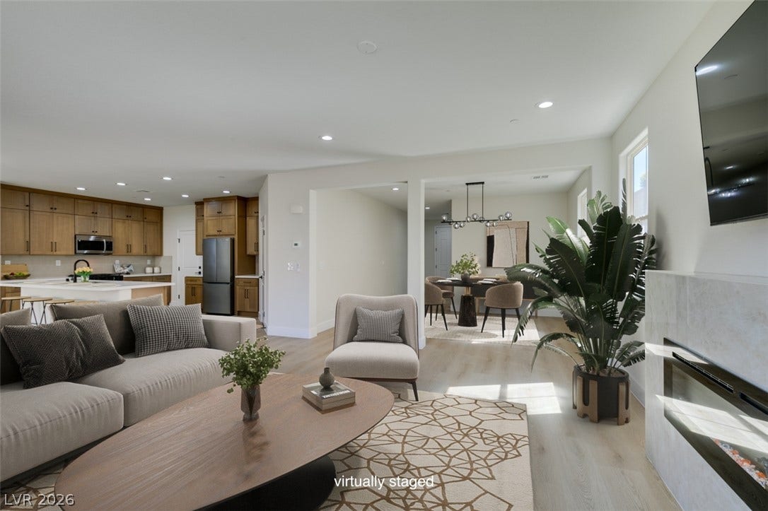 197 Sicily Hills Court, Henderson, NV 89012 Clean lines and smooth flooring define this light-filled modern living area.