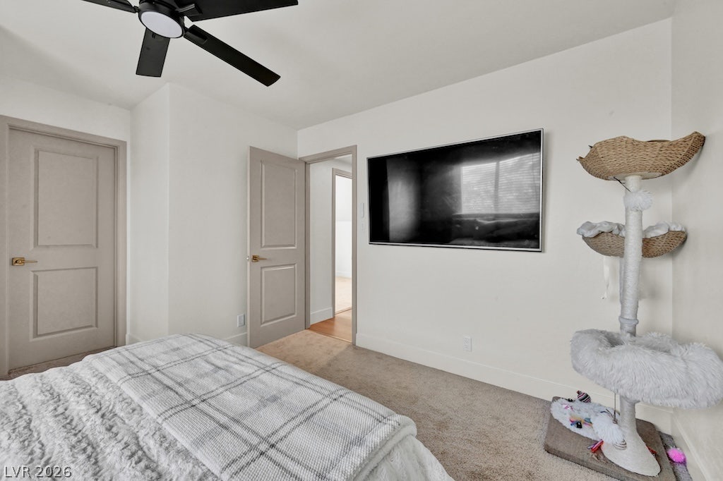 314 Encima Court, Henderson, NV 89014 Smooth plaster walls and neutral carpeting create a serene atmosphere in this bedroom.