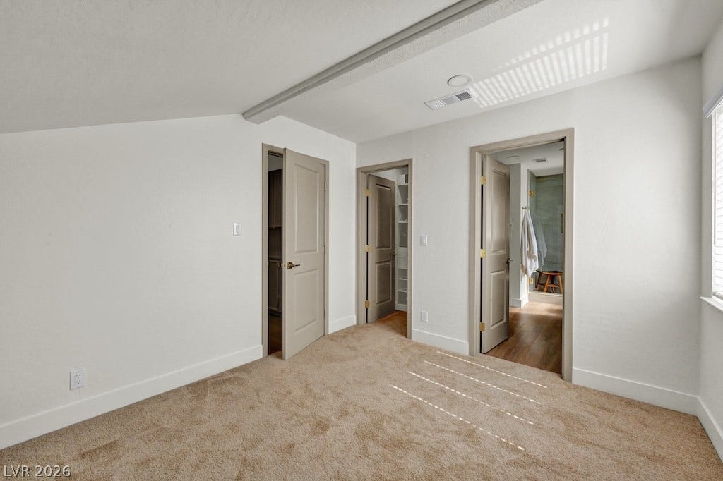 314 Encima Court, Henderson, NV 89014 Warm carpeting and soft natural light define this cozy upper-level bedroom retreat.