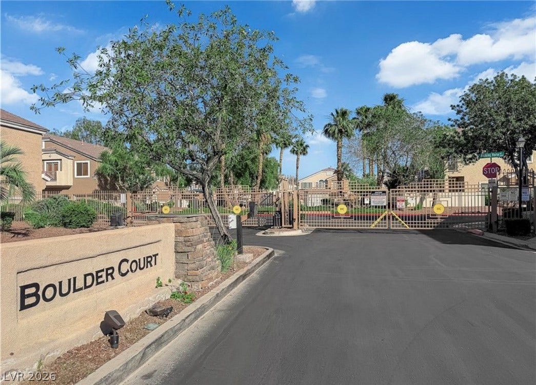 6089 Mustang Breeze Trail, #102, Henderson, NV 89011 Secure gated entry welcomes residents into this professionally landscaped community.