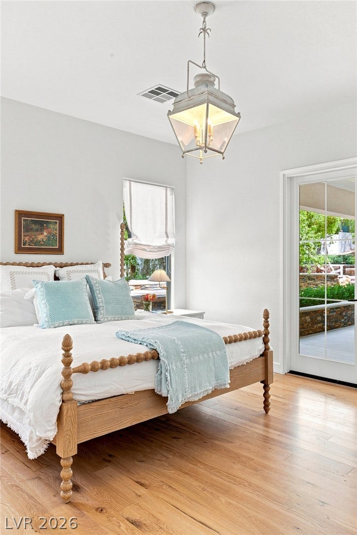 8 Pine Hollow Drive, Henderson, NV 89052 Classic French doors open to outdoor areas,