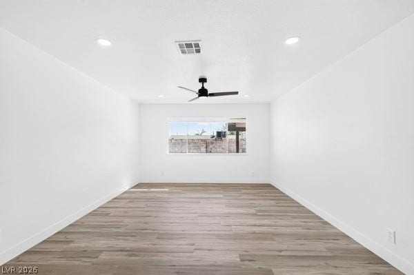 4284 Annie Oakley Drive, Las Vegas, NV 89121 Clean lines and smooth flooring define this minimalist interior space.