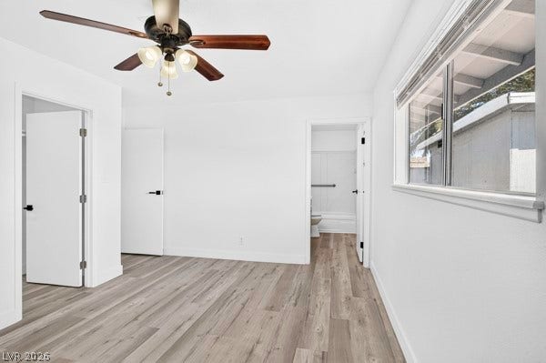 4284 Annie Oakley Drive, Las Vegas, NV 89121 Gleaming new floors run throughout this versatile space leading directly into the en suite bath.