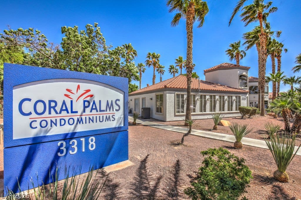 3318 N Decatur Boulevard, #2142, Las Vegas, NV 89130 Stucco exterior finishes and Spanish tile roofing define the architecture of this residential community.