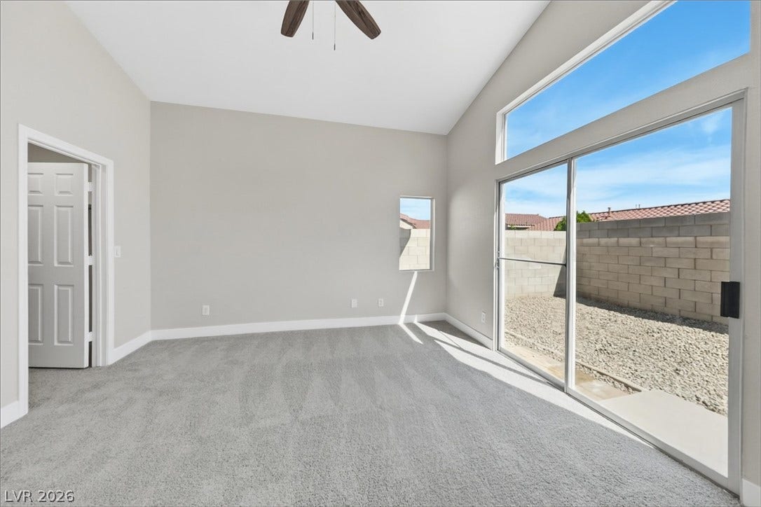 1906 Cardinal Point Street, Henderson, NV 89012 Vaulted ceilings and sliding glass doors create an open, airy feel in this modern space.