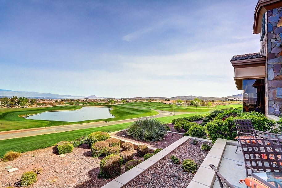 1646 Sebring Hills Drive, Henderson, NV 89052 Sweeping fairways and a serene water feature accent the expansive mountain views from the patio.