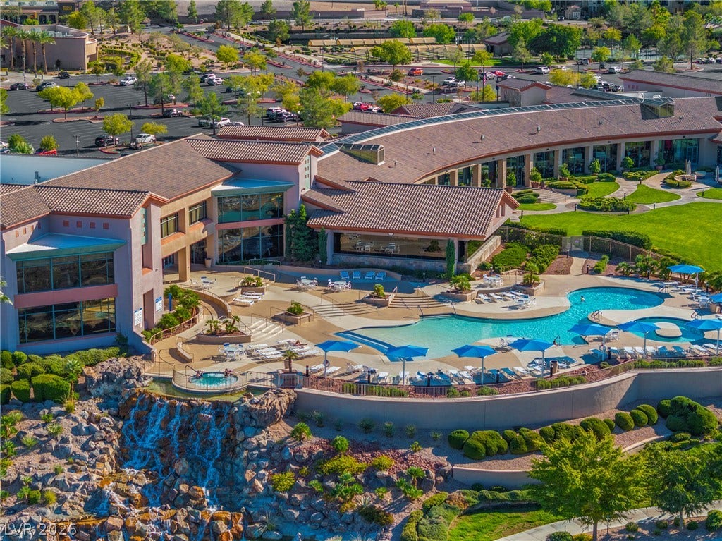 1646 Sebring Hills Drive, Henderson, NV 89052 A resort-style swimming pool and dynamic rock waterfall enhance this expansive community clubhouse complex.