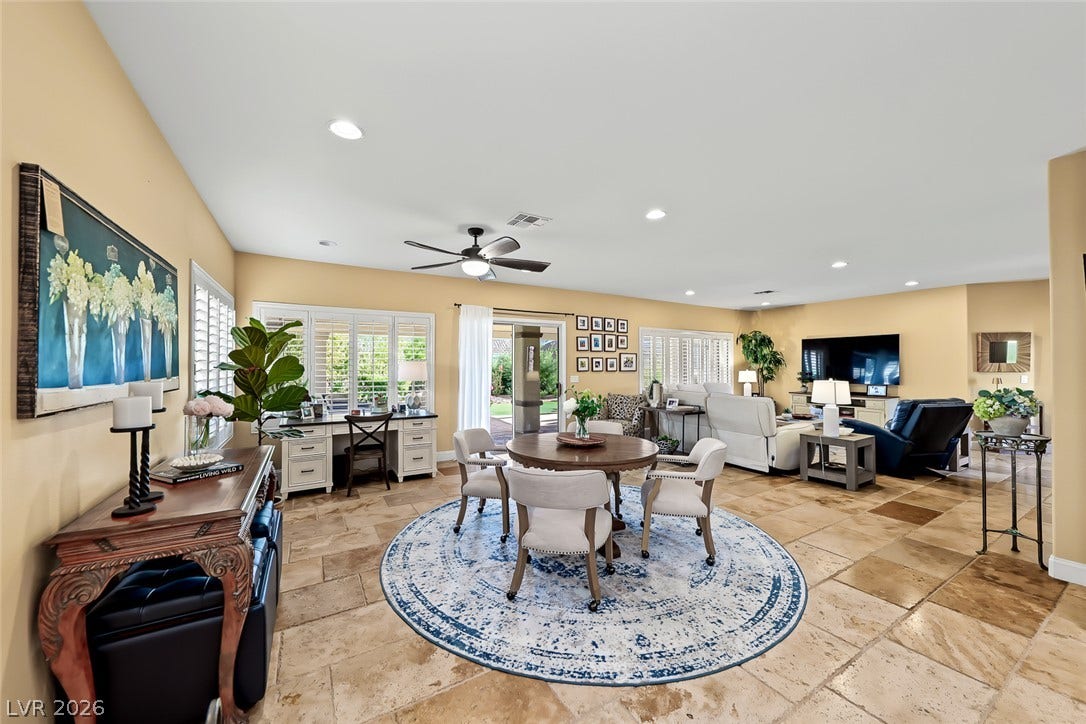 1646 Sebring Hills Drive, Henderson, NV 89052 Gleaming tile floors and natural light from large shuttered windows define this open living space.