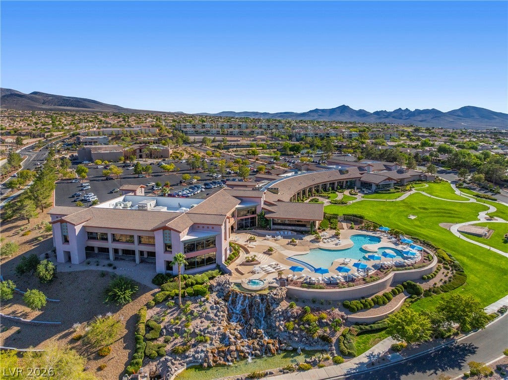 1646 Sebring Hills Drive, Henderson, NV 89052 A striking community center displays tiled roofing, expansive lawns, and structured resort-style swimming pools.