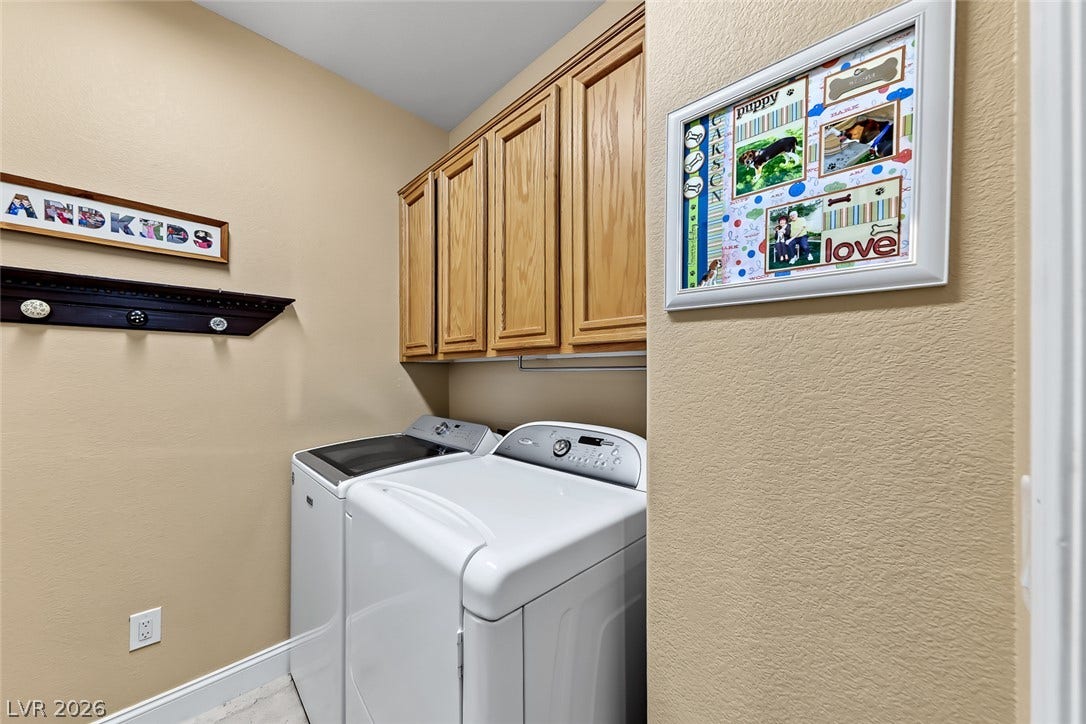 1646 Sebring Hills Drive, Henderson, NV 89052 Ample wooden cabinetry and dedicated appliances bring efficient function to this tidy utility room.