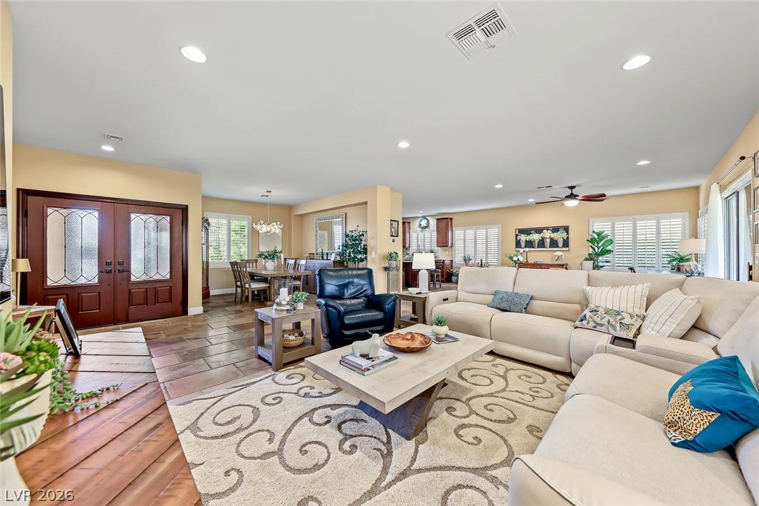 1646 Sebring Hills Drive, Henderson, NV 89052 An open floorplan seamlessly connects the welcoming entryway to the main living and dining spaces.