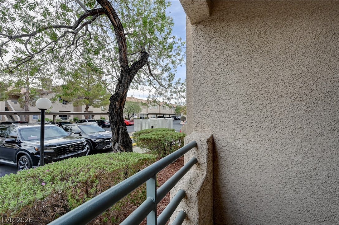 5415 W Harmon Avenue, #1029, Las Vegas, NV 89103 Mature trees and neat landscaping frame the view from this private covered patio.