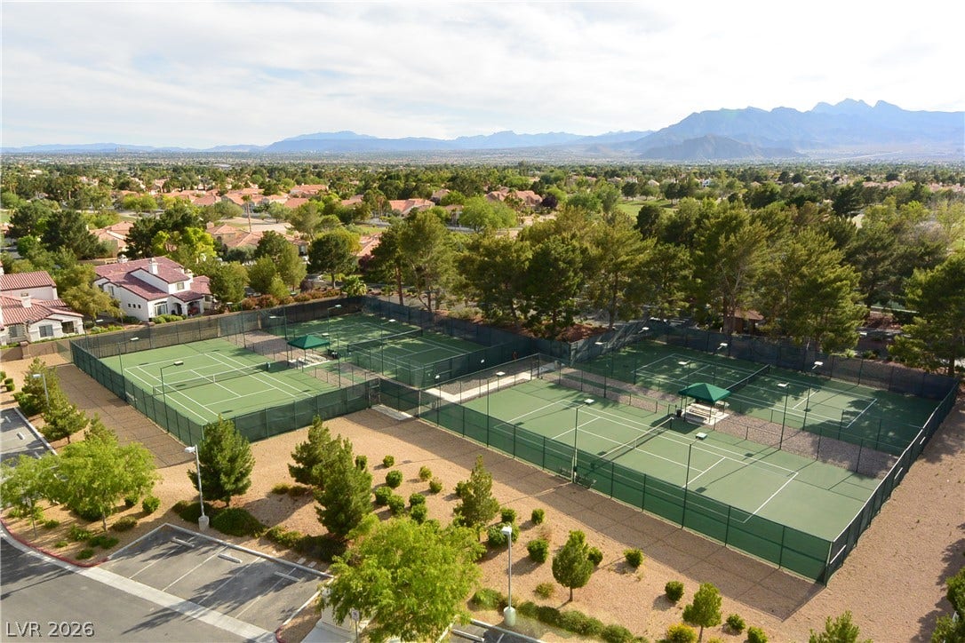 7652 Rolling View Drive, #202, Las Vegas, NV 89149 Painted Desert tennis courts sit nestled against a majestic mountain backdrop.