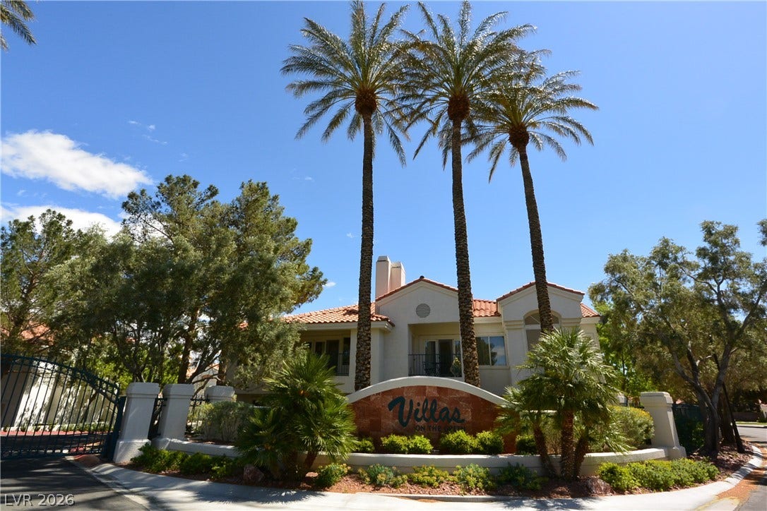 7652 Rolling View Drive, #202, Las Vegas, NV 89149 Towering palm trees frame the gated entrance to Villas On THe Green!